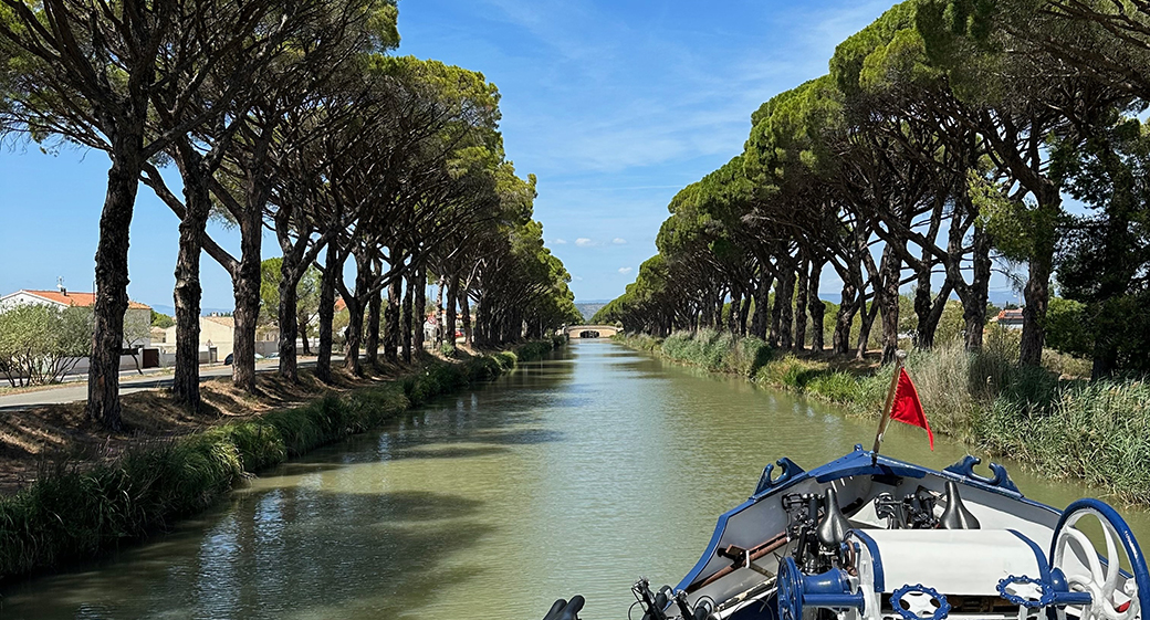 Beautiful countryside along the Canal du Midi on board hotel barge Anjodi