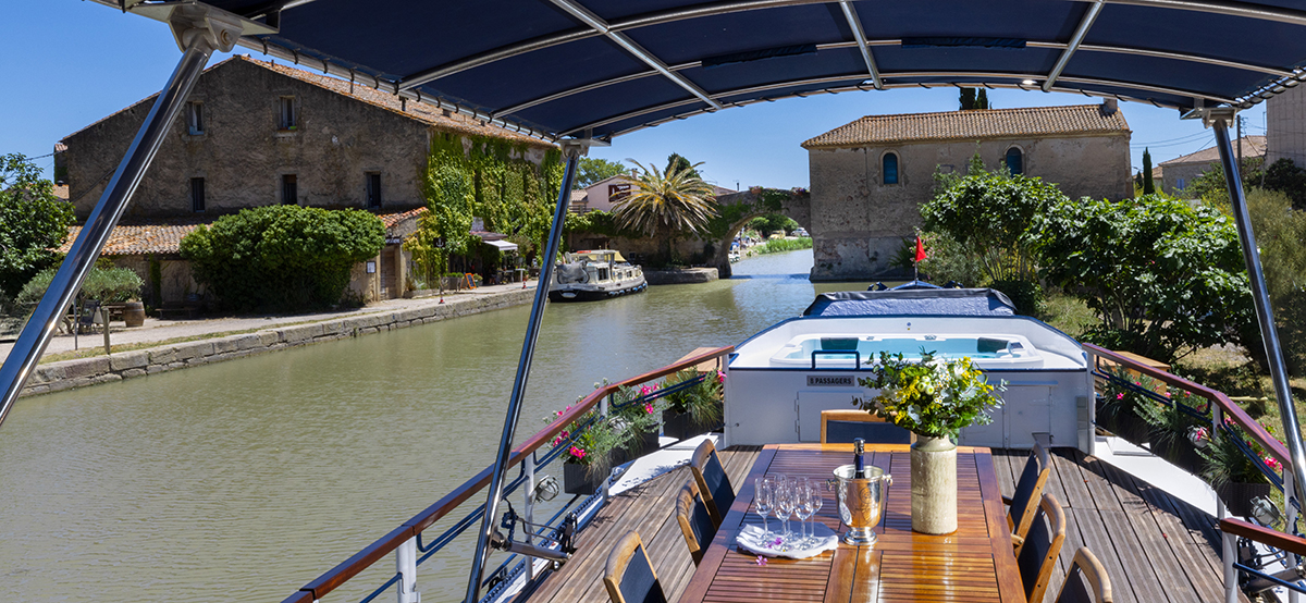 Stunning mooring at Le Somail on the Canal du Midi from hotel barge Anjodi