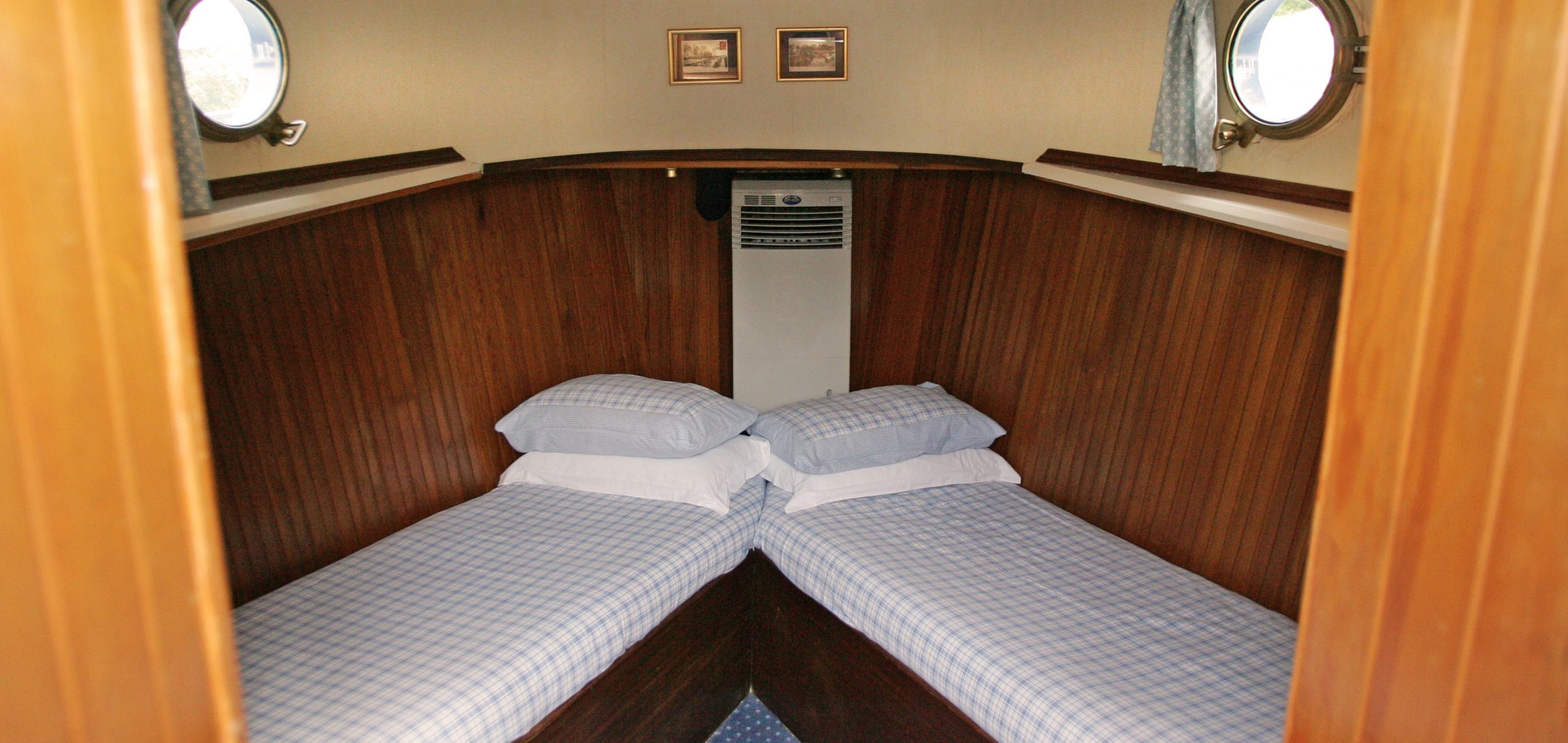 Well-appointed cabins on board hotel barge Nymphea