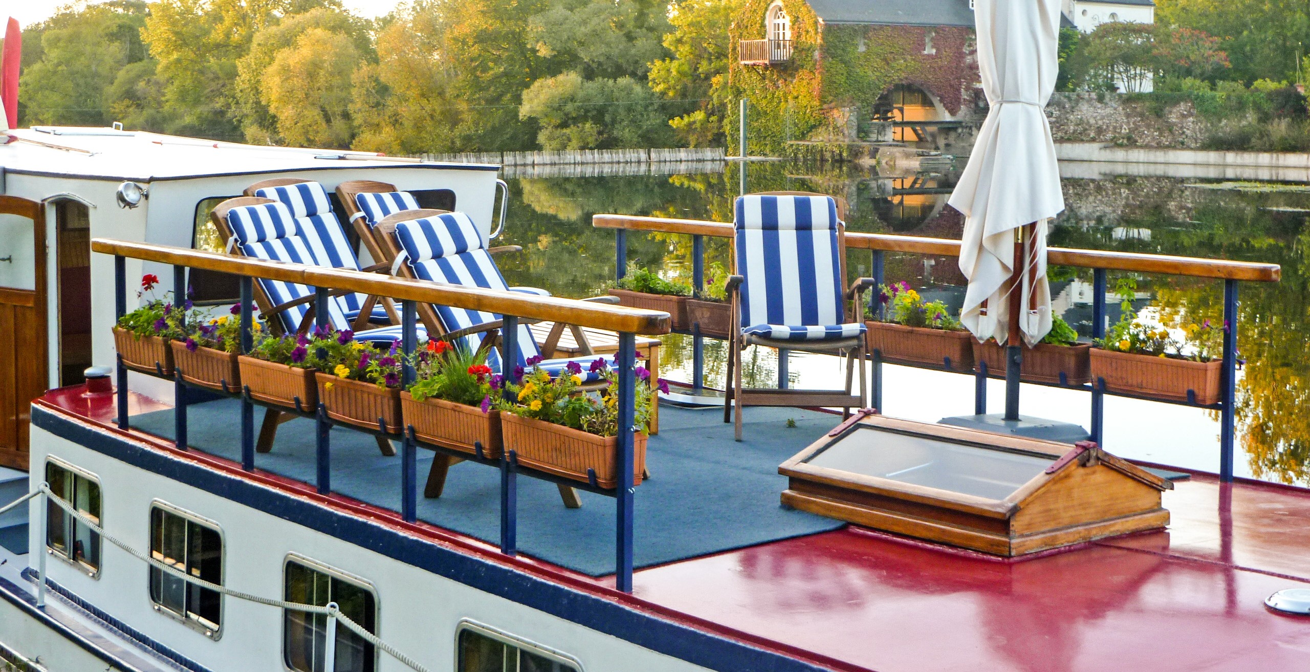 Guests enjoy beautiful views from hotel barge Nymphea